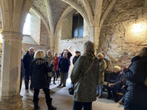 A tour group in the Warming Room